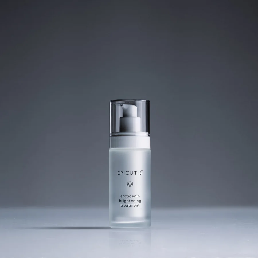 The Epicutis Arctigenin Brightening Treatment bottle, photographed on a charcoal ground.