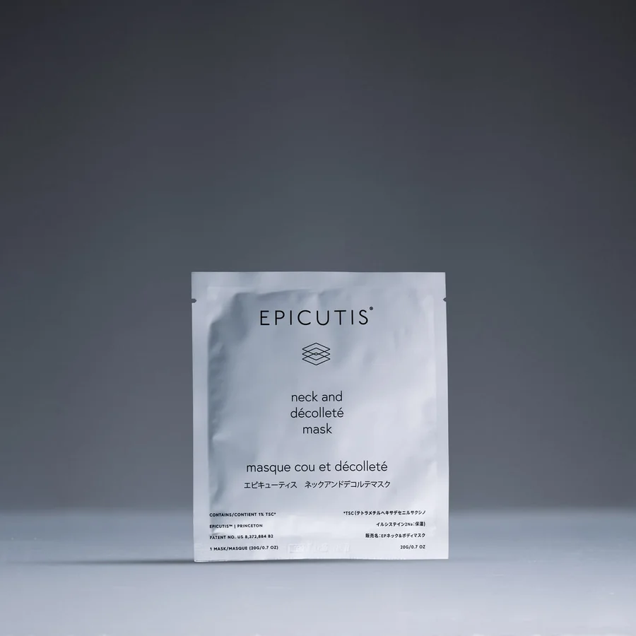The Epicutis neck and décolleté recovery mask sachet, photographed on a charcoal ground.